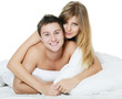 Beautiful pair lays in a bed