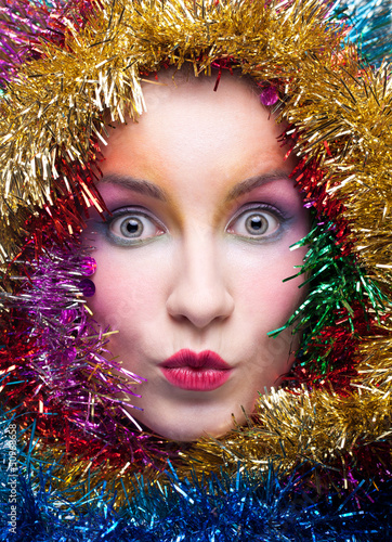 Photo: Woman in tinsel Christmas costume Woman in tinsel Christmas costume