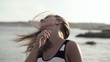 Happy woman with beautiful hair, super slow motion