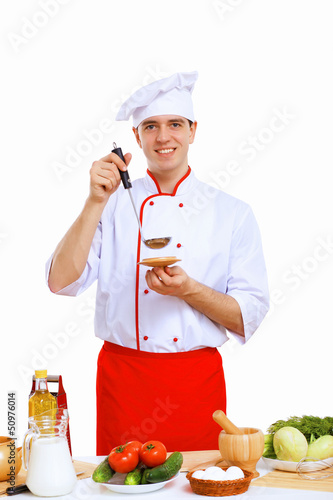 Photo: Young cook preparing food Young cook preparing food