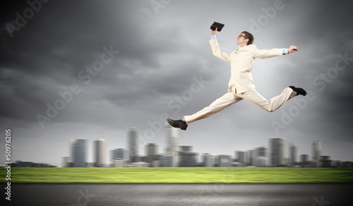 Photo: Image of running businessman Image of running businessman