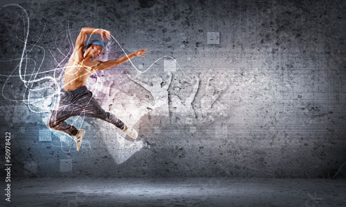 Photo: young man dancing hip hop with color lines young man dancing hip hop with color lines