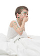 sick boy cough in white bed
