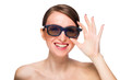 Beautiful young woman in black glasses