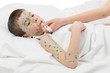temperature measurement sick boy in bed
