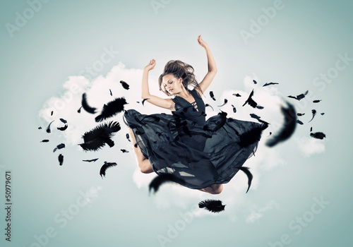 Photo: Young girl floating Young girl floating