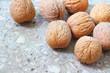 Photo: Walnuts on stony background Walnuts on stony background