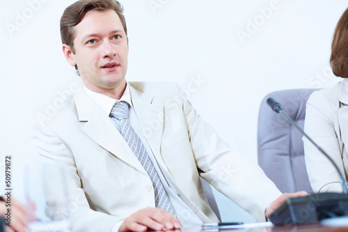 Photo: Businessman at meeting Businessman at meeting