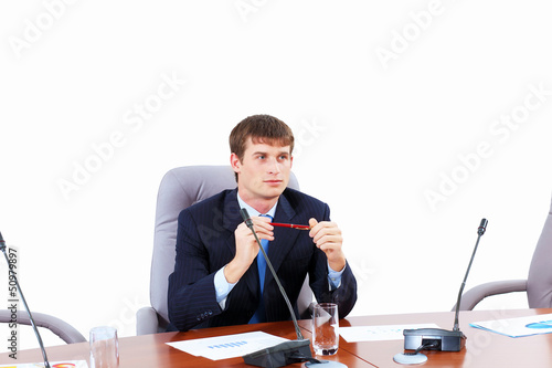 Photo: Businessman at meeting Businessman at meeting