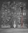 businessman climbing on ladder drawing business plan