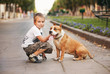 Photo: Happy young Boy and his dog Happy young Boy and his dog