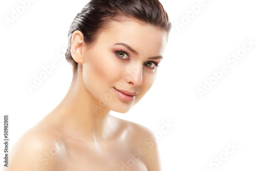 Photo: Beauty face of beautiful woman with clean fresh skin - isolated Beauty face of beautiful woman with clean fresh skin - isolated