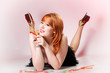 happy redhair woman with gummy candy