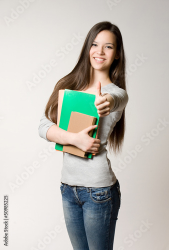 Photo: Cute young student girl. Cute young student girl.