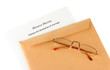 Divorce decree and envelope on white background