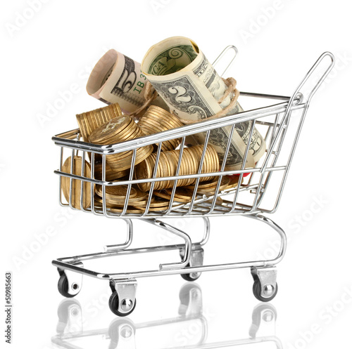 Photo: shopping trolley with dollars and Ukrainian coins, isolated shopping trolley with dollars and Ukrainian coins, isolated