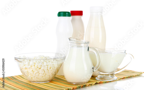 Photo: Dairy products on napkin isolated on white Dairy products on napkin isolated on white