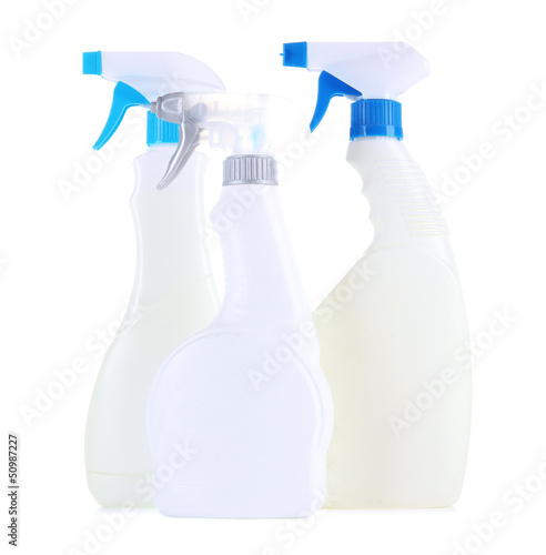 Photo: Different kinds of sprays for house cleaning, isolated on white Different kinds of sprays for house cleaning, isolated on white
