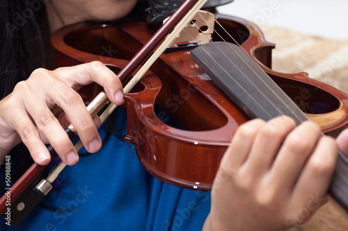 Photo: Playing the violin, musical instrument with performer hands Playing the violin, musical instrument with performer hands
