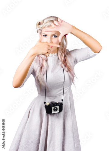 Photo: Blond woman framing picture Blond woman framing picture