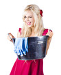 Woman with bucket and rubber gloves