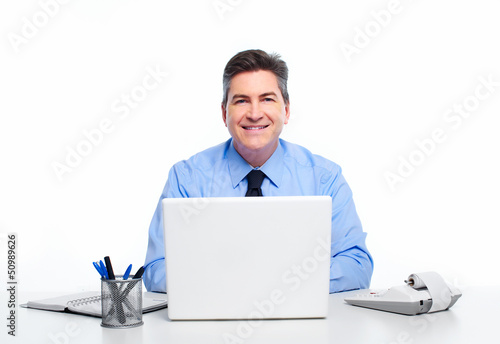 Photo: Businessman with laptop computer. Businessman with laptop computer.