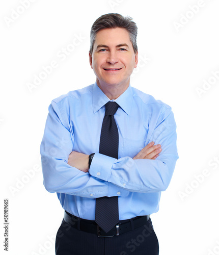 Photo: Businessman isolated on white. Businessman isolated on white.
