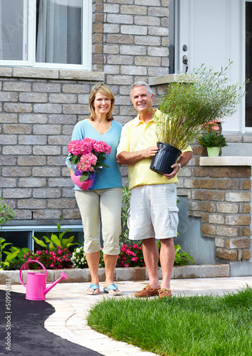Photo: Gardening senior couple. Gardening senior couple.