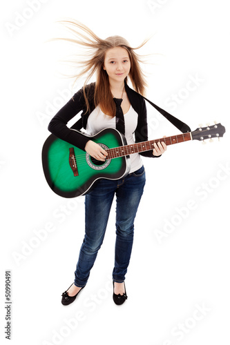 Photo: Beautiful girl with guitar on white background Beautiful girl with guitar on white background