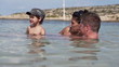 Happy family in the sea, super slow motion, shot at 240fps