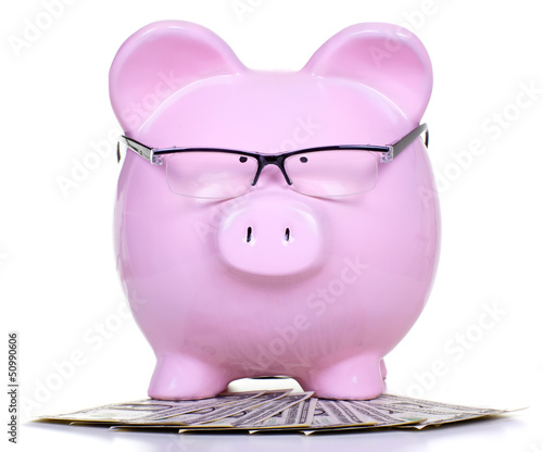 Photo: Piggy bank with money. Piggy bank with money.