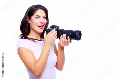 Photo: Woman with a photocamera. Woman with a photocamera.