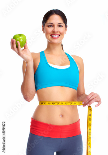 Photo: Young beautiful fitness woman. Young beautiful fitness woman.