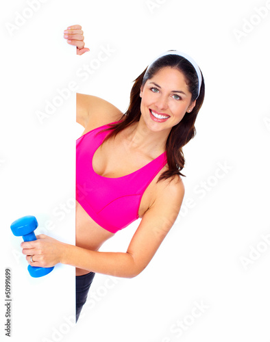 Photo: Young beautiful fitness woman. Young beautiful fitness woman.