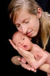 Loving mother on black