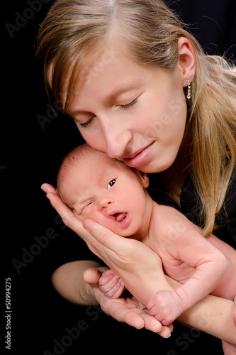 Photo: Loving mother on black Loving mother on black