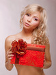 Donation. Beauty Blonde holding Red Box as a Present. Holiday