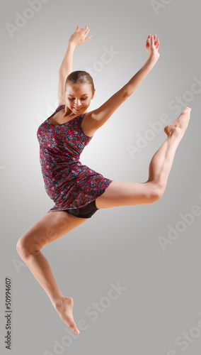 Photo: Girl in color dress dancing Girl in color dress dancing
