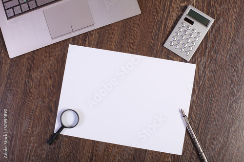 Photo: Businessman workplace with papers Businessman workplace with papers