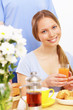 Young woman drinking juice