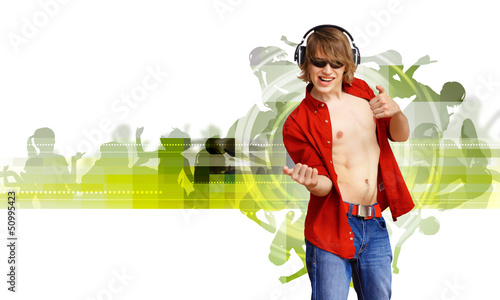 Photo: Happy smiling young man dancing Happy smiling young man dancing