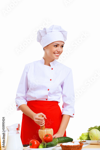 Photo: Young cook preparing food Young cook preparing food