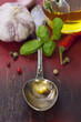 Spoon with Olive Oil and vegetables