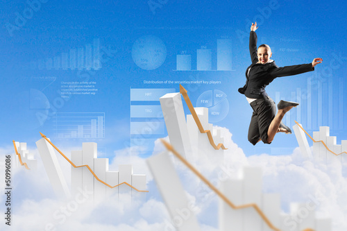Photo: businesswoman in black suit jumping businesswoman in black suit jumping