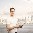 man holding tablet