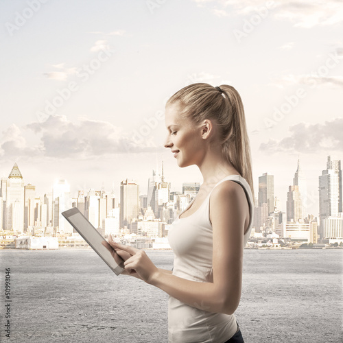 Photo: lady with touch pad lady with touch pad