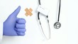 Doctors Hand with thumbs up and stethoscope