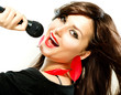 Beautiful Singing Girl. Beauty Woman with Microphone over White