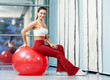 Happy healthy woman with fitness ball