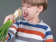 Young boy hates vegetable